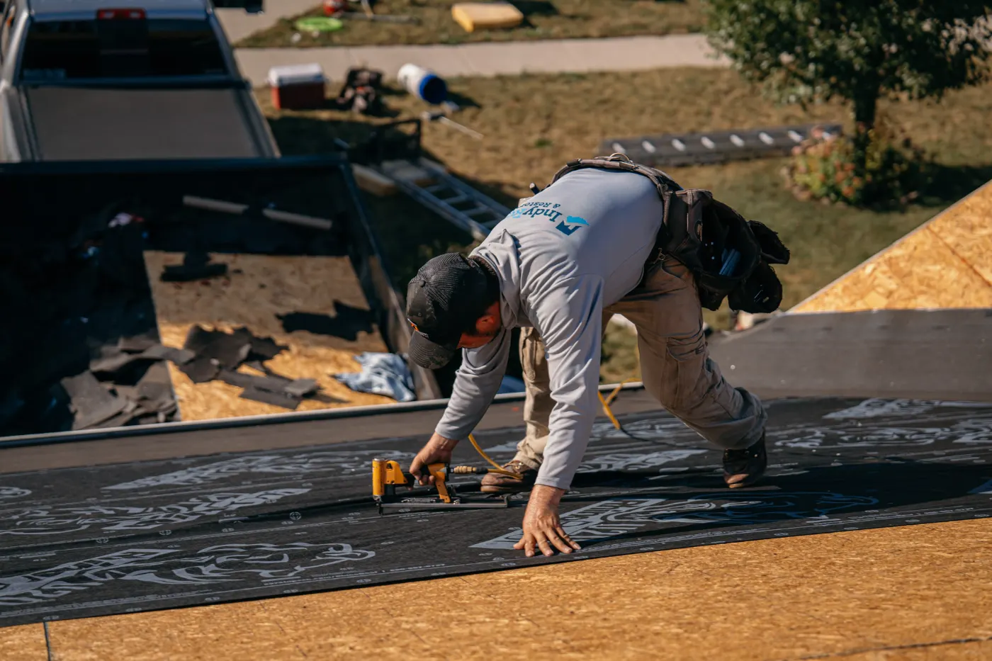 Tarping and dry-in on a Sweetser commercial roof